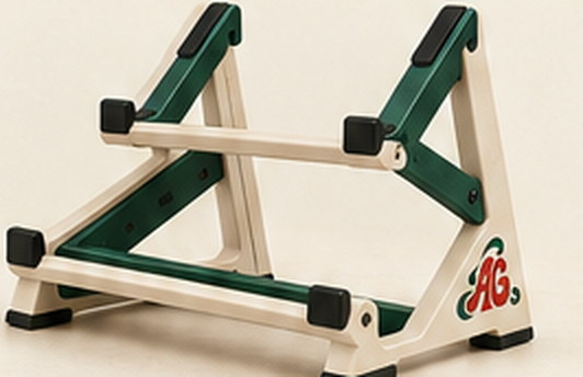An ivory and green two-tier stand seen from the side